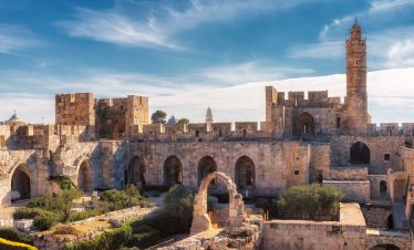 Visit the historic Tower of David on a Lionsgate Travel tour, featuring the ancient fortress and museum against the backdrop of Jerusalem's Old City.